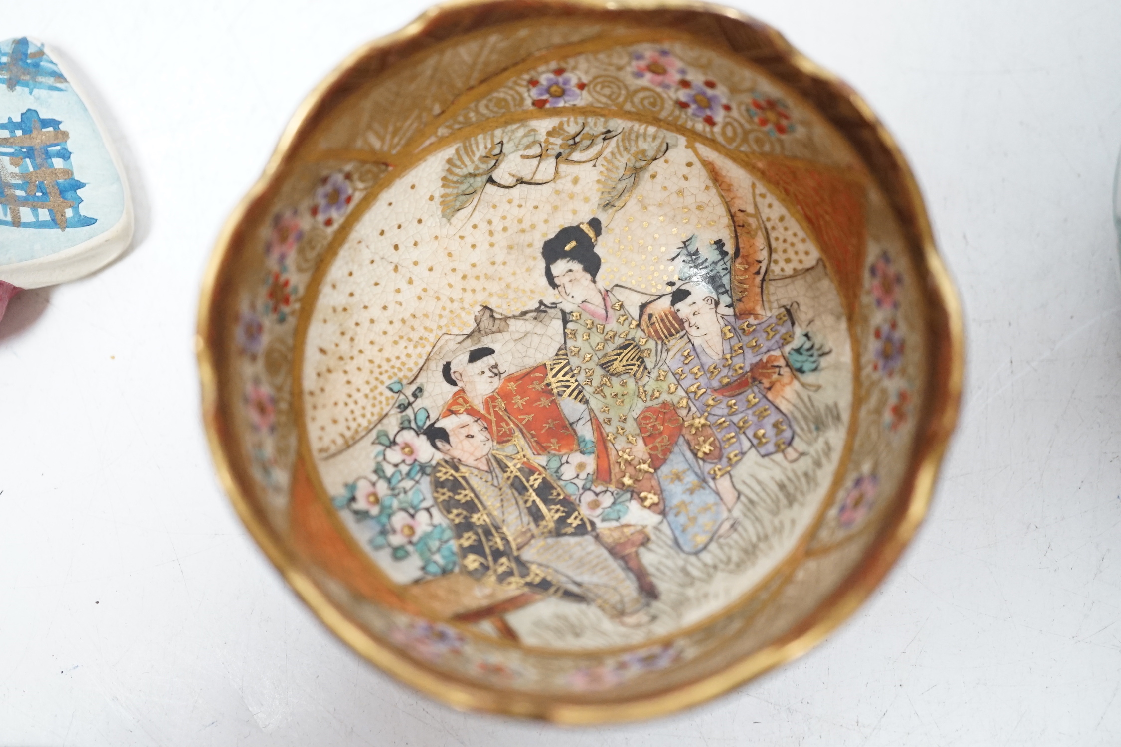 A pair of late 19th century Chinese famille rose jars and covers, Satsuma small bowl and two pottery models, 7cm wide